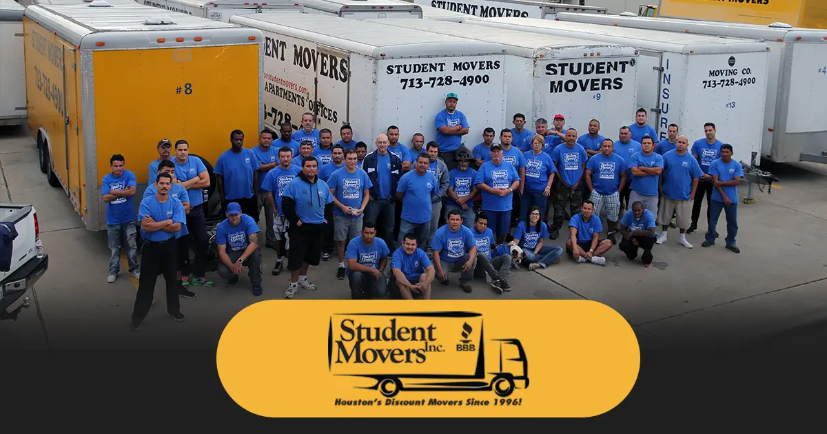 Student movers team with their trucks.