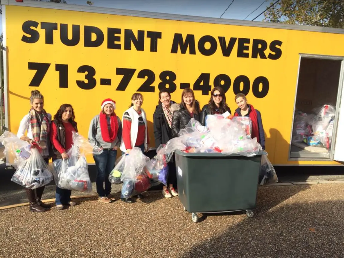 Student Movers staff and community members participating in a local Houston charity event.